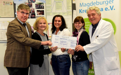 GGU übergibt Spende an die Magdeburger Krebsliga